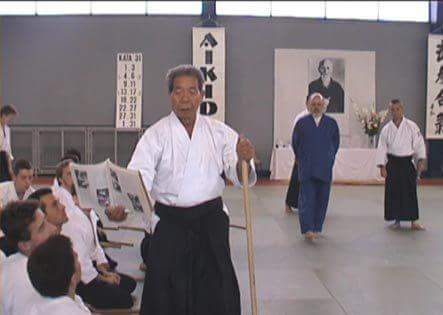 Morihiro Saito teaching from the 1938 technical manual "Budo"