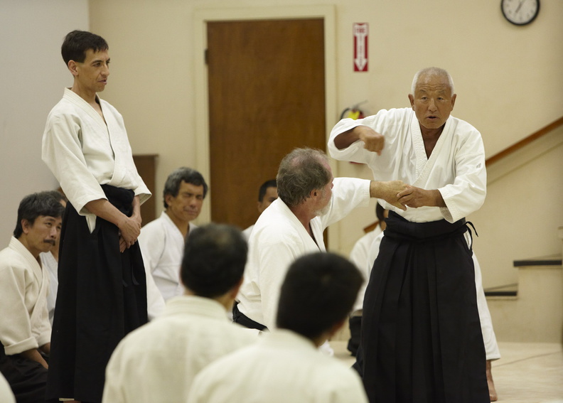 Chris Li translating for Seijuro Masuda Sensei at the Aikido Ohana in Honolulu Hawaii, 2010. Art May (Wago Enten Dojo) taking ukemi. seijuro-masuda-art-may.jpg