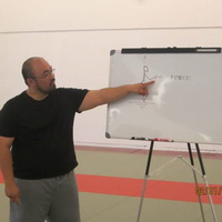 Mert Gambito and the white board