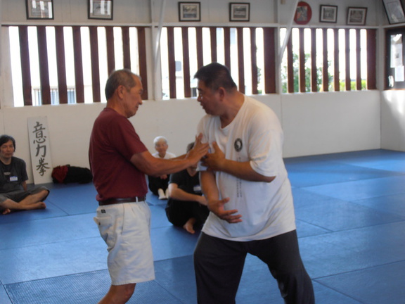 Sifu Shows Hiroshi Kato a Point