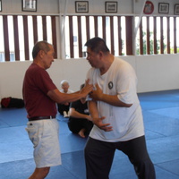 Sifu Shows Hiroshi Kato a Point