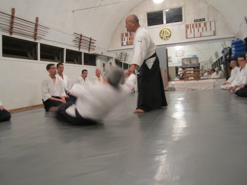 Takeshi Yamashima sensei and Glenn Yoshida (Aikido Renshinkan) at the Windward Aikido Club on Oahu in Kaneohe Hawaii. Chris Li translating on left. windward-aikido-yamashima-yoshida-3.jpg
